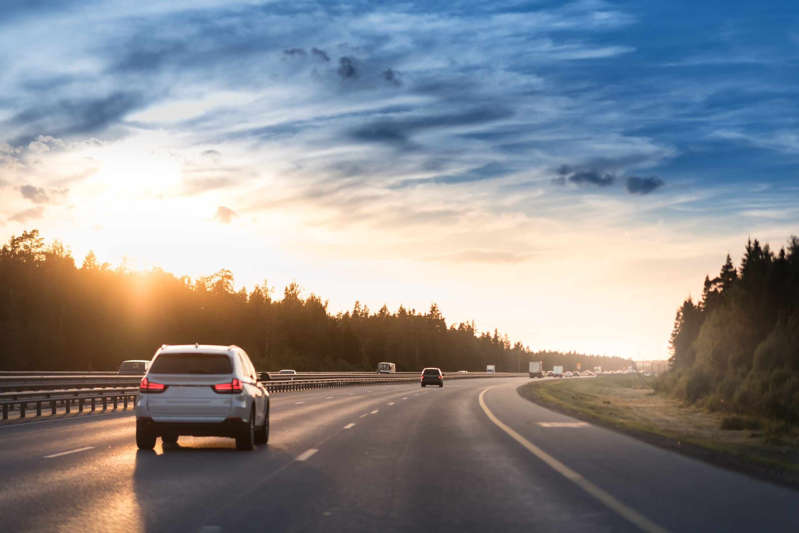 Car driving on motorway in summer